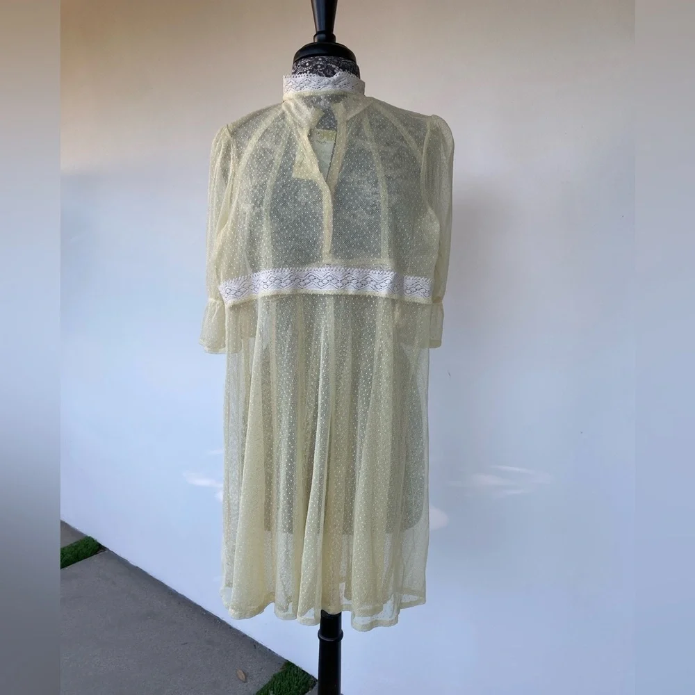 Elegant Cream Lace Dress by Free People size medium.